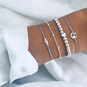 WUKALO Bohemian Gold Color Tassel Angel Bracelets for Women Boho Jewelry Geometric Layered Pearl Hand Chain Charm Bracelet Set | 0 | Tage-Active