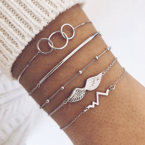 WUKALO Bohemian Gold Color Tassel Angel Bracelets for Women Boho Jewelry Geometric Layered Pearl Hand Chain Charm Bracelet Set | 0 | Tage-Active